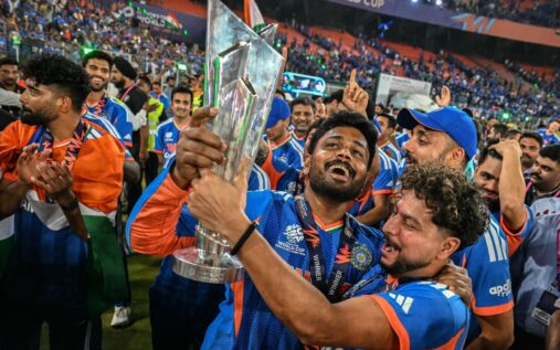 Suryakumar Yadav and the India cricket team lifting the T20 World Cup trophy in celebration