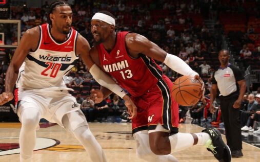 Bam Adebayo handling the basketball on the court for the Miami Heat