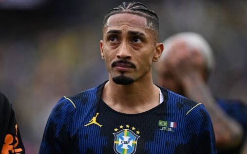 Barcelona forward Raphinha appearing dejected on the pitch