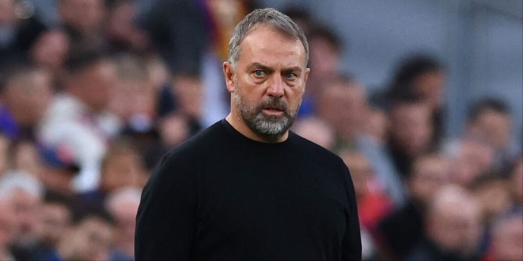 Tottenham defender Micky van de Ven gesturing on the pitch during a Premier League match