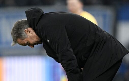 Bayer Leverkusen head coach Kasper Hjulmand standing on the touchline