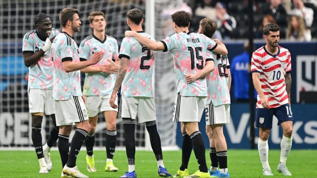 Belgium players celebrating a goal against the United States at Mercedes-Benz Stadium