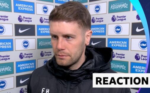Brighton striker Danny Welbeck celebrating on the pitch during a Premier League match