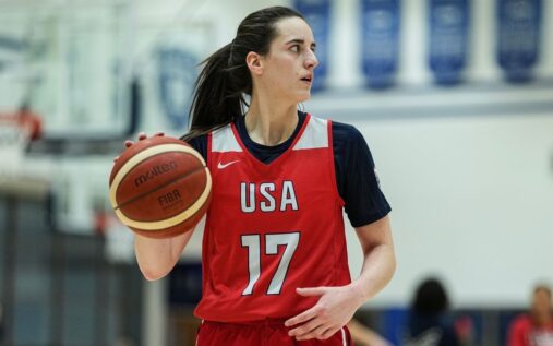 Caitlin Clark smiling during a Team USA basketball training session