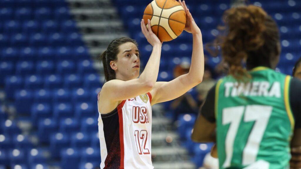 Caitlin Clark dribbling the basketball in her United States national team uniform