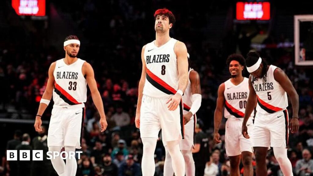 Carolina Hurricanes owner Tom Dundon smiling after completing the purchase of the Portland Trail Blazers