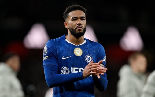 Chelsea defender Reece James walking off the pitch looking disappointed