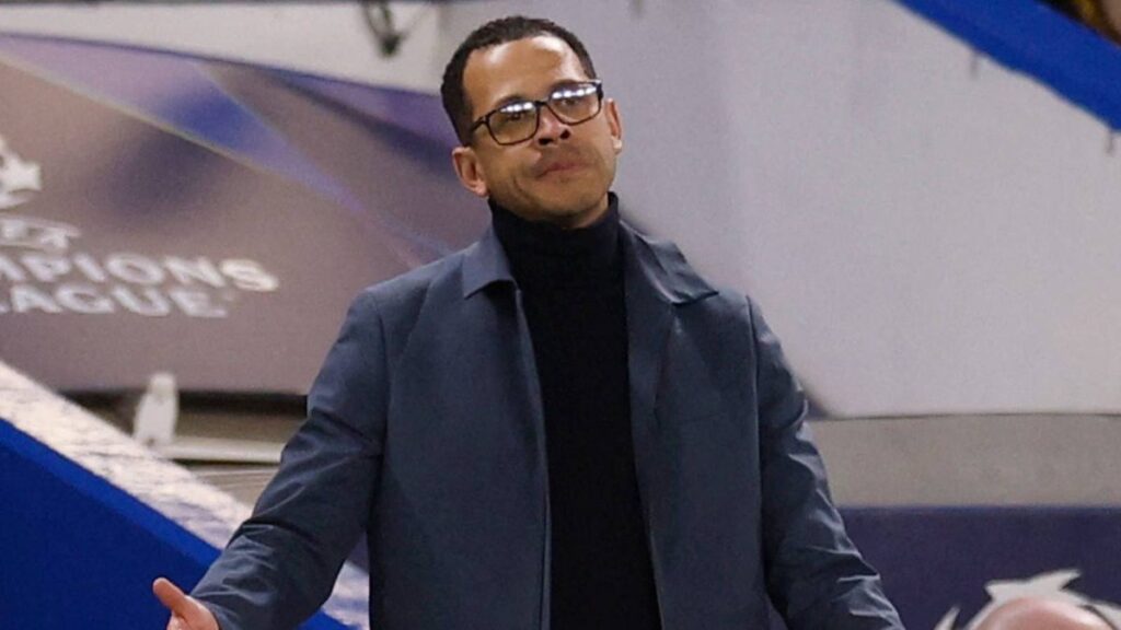 Liam Rosenior looking dejected on the touchline during a Chelsea match