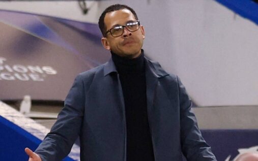 Liam Rosenior looking dejected on the touchline during a Chelsea match