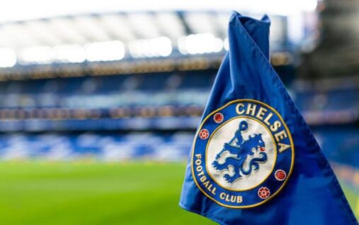 The Chelsea club crest displayed on a stadium flag at Stamford Bridge