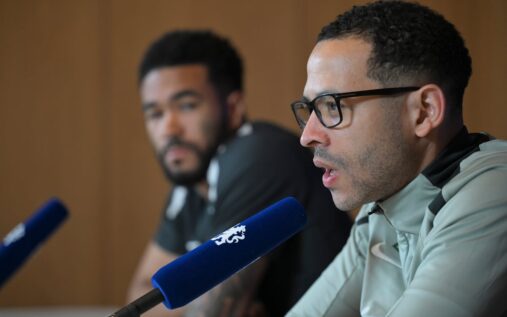 Chelsea manager Liam Rosenior looking thoughtful on the touchline during a match