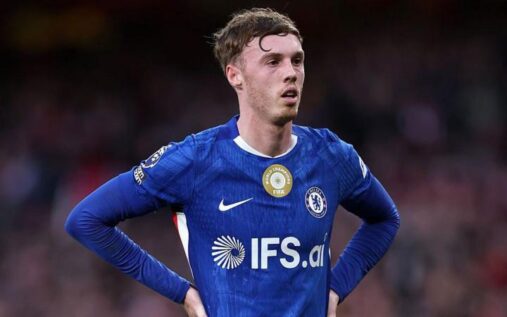 Cole Palmer looking dejected on the pitch during a match for Chelsea