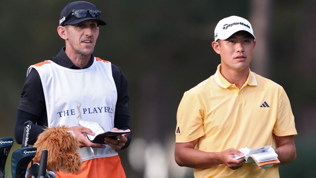 Collin Morikawa holding his lower back in pain during The Players Championship at TPC Sawgrass