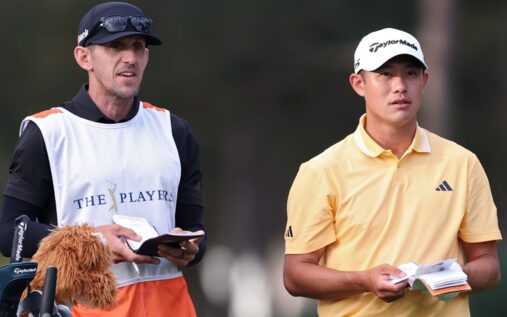 Collin Morikawa holding his lower back in pain during The Players Championship at TPC Sawgrass