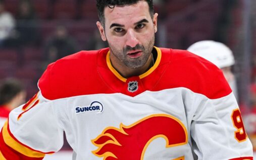 Nazem Kadri skating with the puck in a Colorado Avalanche jersey during the 2022 season