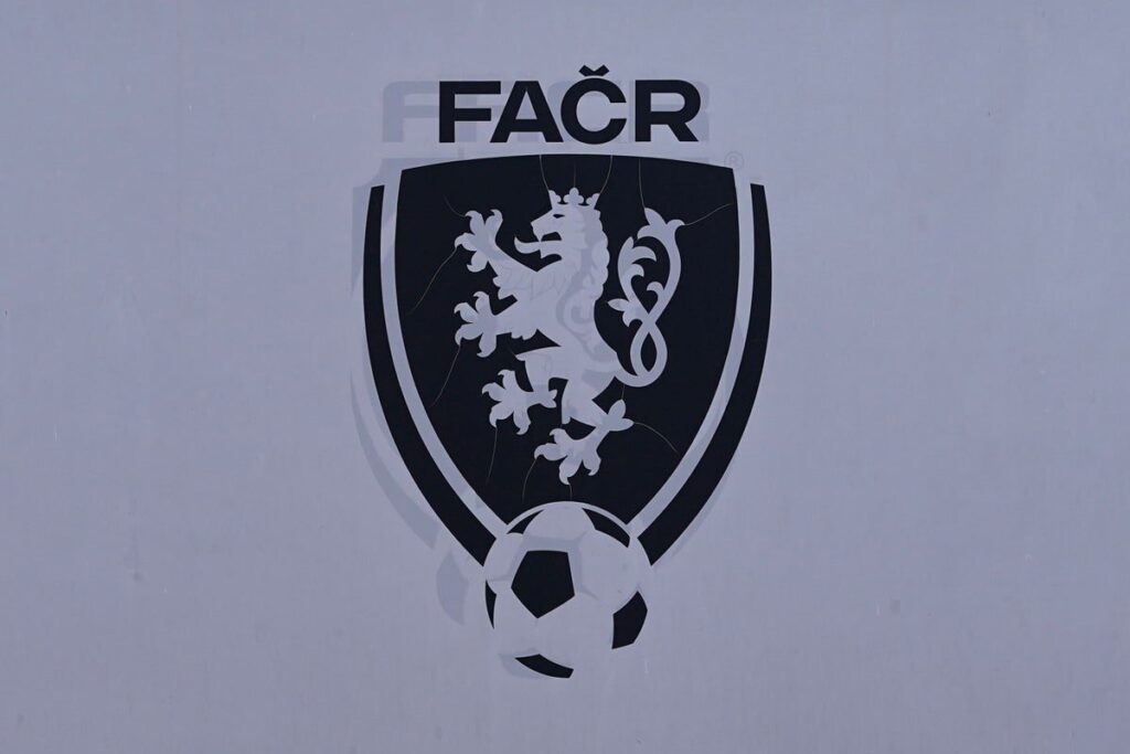 Czech police officers conducting a raid during a football match-fixing and illegal betting investigation