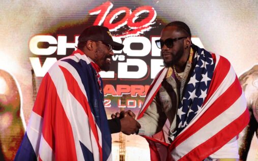 Derek Chisora and Deontay Wilder facing off in a boxing ring ahead of their heavyweight clash