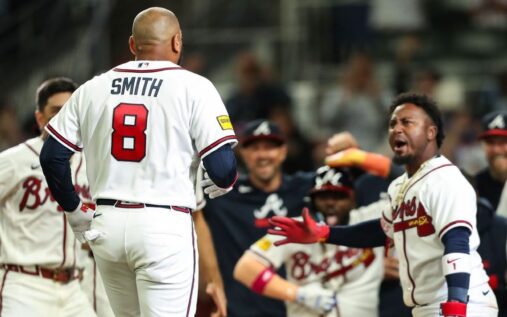 Atlanta Braves batter Dominic Smith celebrating his historic walk-off grand slam