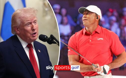 Tiger Woods walking on the undulating golf course at Augusta National