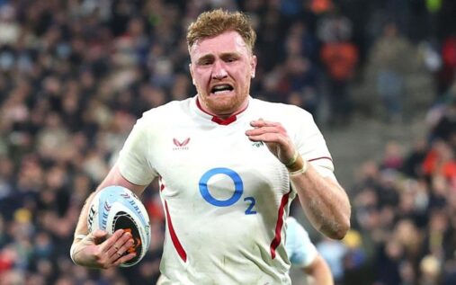 England rugby player Ollie Chessum sprinting with the ball to score an intercept try