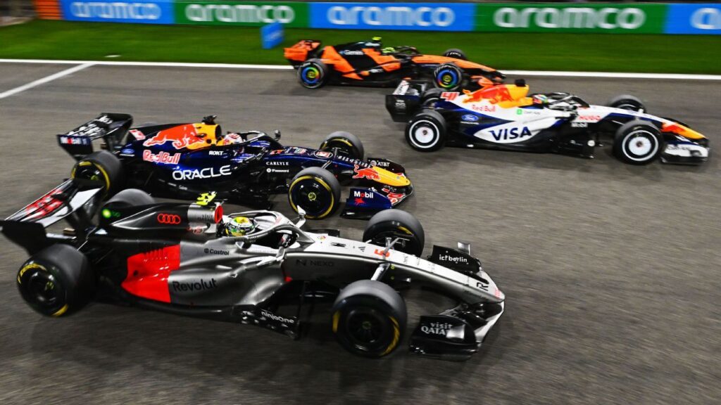 Formula 1 cars lined up on the starting grid at the Australian Grand Prix preparation