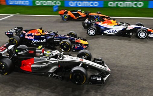 Formula 1 cars lined up on the starting grid at the Australian Grand Prix preparation
