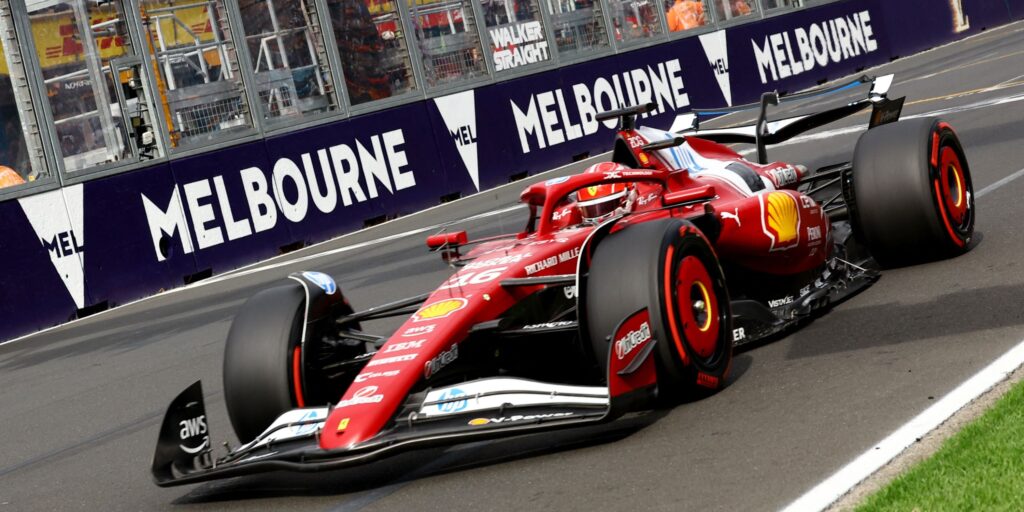Formula One cars racing around the Albert Park circuit in Melbourne