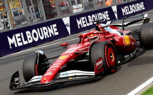 Formula One cars racing around the Albert Park circuit in Melbourne
