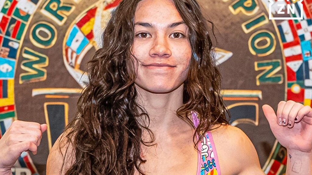 Teenage boxer Isis Sio competing in the ring