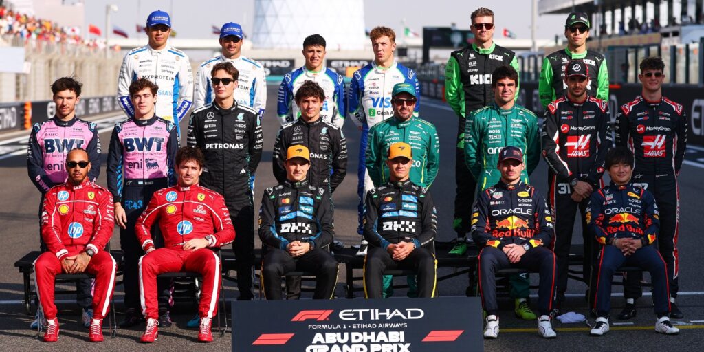 Fernando Alonso looking frustrated in the Aston Martin garage during the Formula 1 Chinese Grand Prix