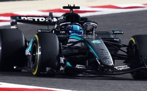 A Mercedes Formula 1 car navigating a corner on a race track