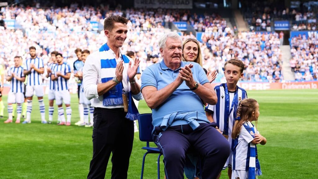 John Toshack standing on the touchline managing the Wales national team