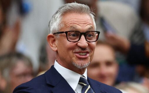 Gary Lineker gesturing while speaking into a microphone on a podcast