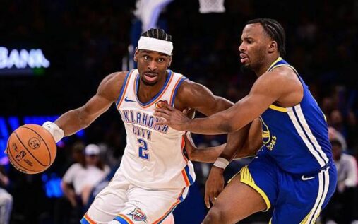 Shai Gilgeous-Alexander of the Oklahoma City Thunder dribbling the ball during an NBA game