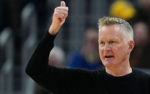 Golden State Warriors head coach Steve Kerr looking dejected on the sidelines during an NBA game