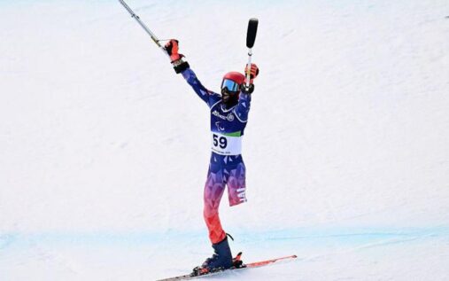 Ralf Etienne of Haiti competing in alpine skiing at the Milan-Cortina Winter Paralympic Games
