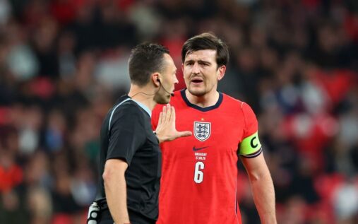 Harry Maguire expressing frustration on the pitch during England's match against Uruguay