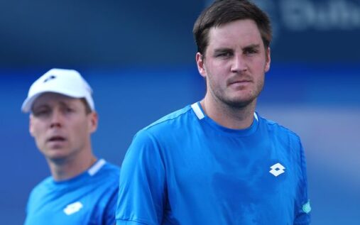 Harri Heliovaara and Henry Patten competing on court during a tennis match