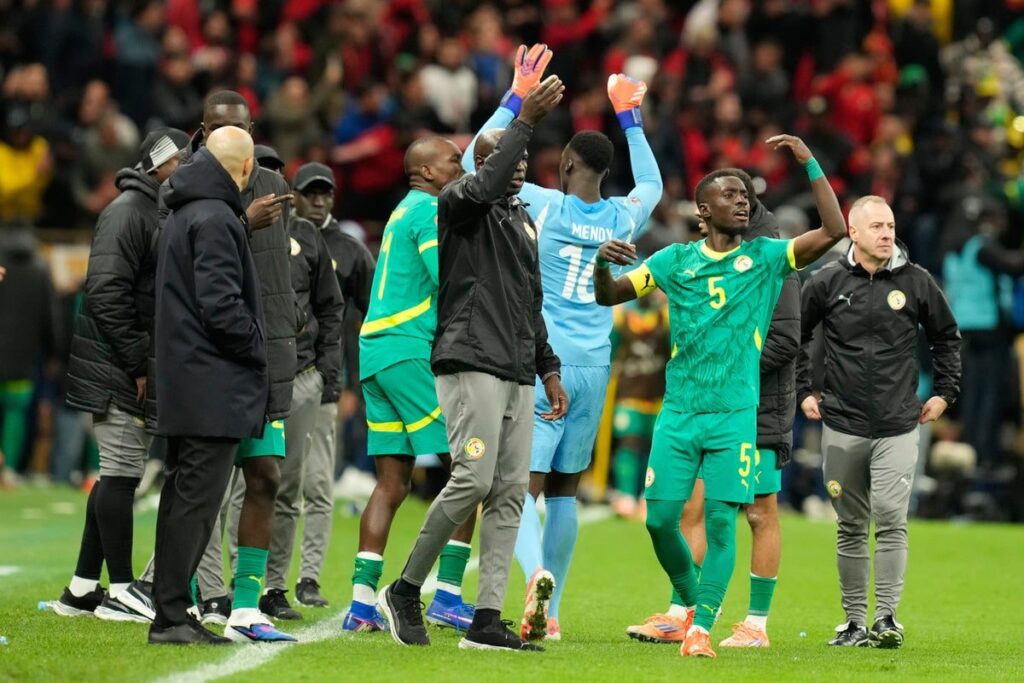 Idrissa Gueye playing for Senegal in a green national team kit during the Africa Cup of Nations