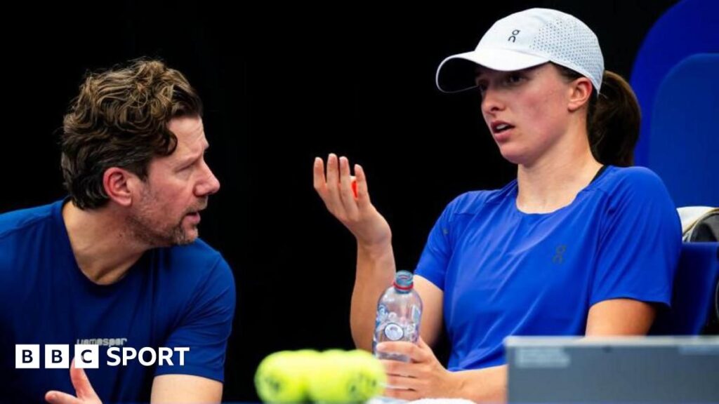 Iga Swiatek looking disappointed on court during her second-round match at the Miami Open