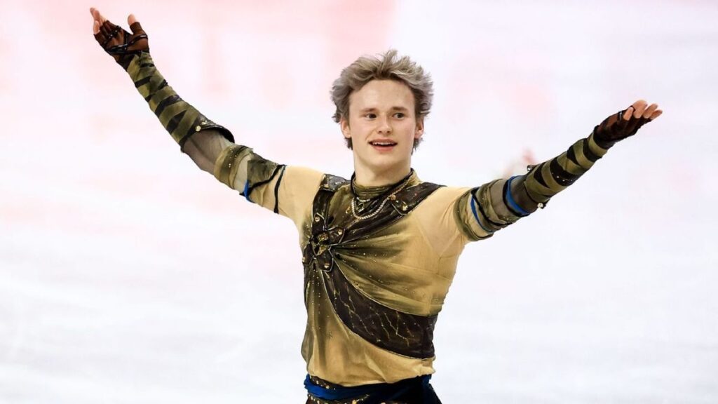 Ilia Malinin performing his short program routine on the ice at the World Figure Skating Championships