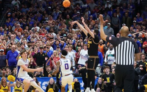 Alvaro Folgueiras shooting a late three-pointer for the Iowa Hawkeyes against Florida