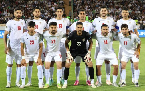Iran national football team lining up on the pitch ahead of a World Cup qualifying match