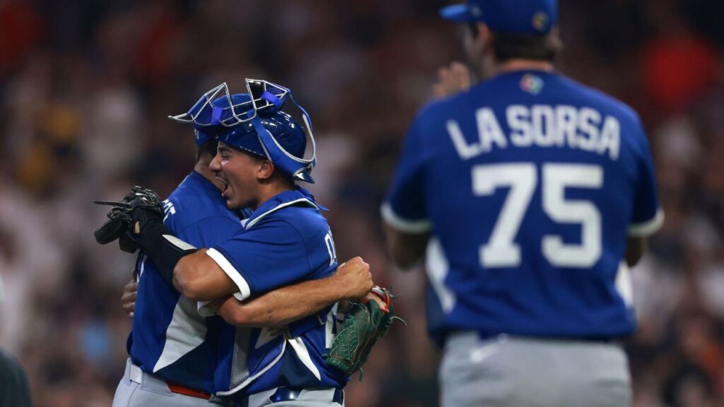 Italy baseball players celebrate their shock 8-6 victory over the United States at the World Baseball Classic