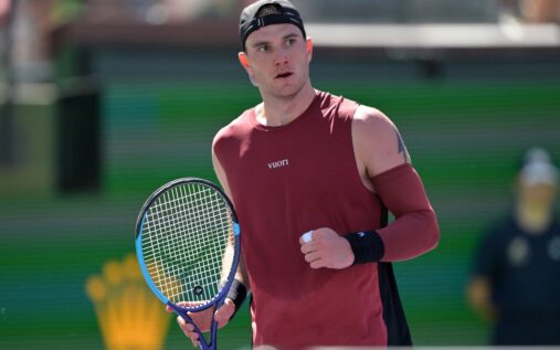 Jack Draper hitting a powerful forehand during his match at Indian Wells