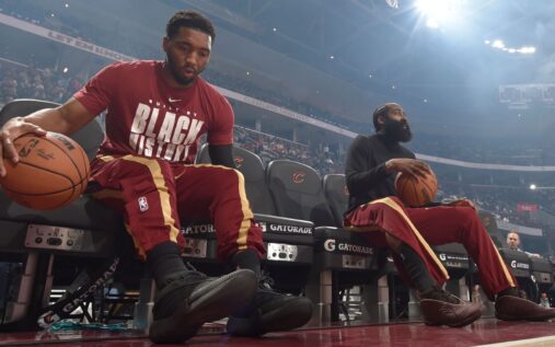 James Harden and Donovan Mitchell talking on the court during a Cleveland Cavaliers game