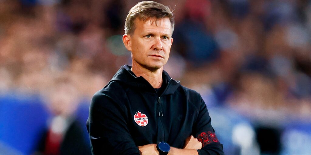 Jesse Marsch smiling while managing the Canada Men's National Team