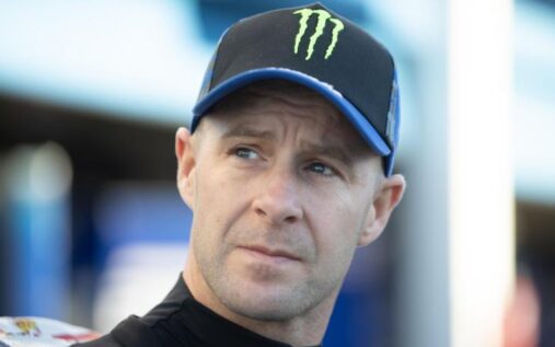 Jonathan Rea riding a Honda motorcycle on track during a World Superbike Championship event.