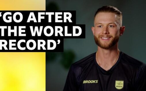 Josh Kerr running on the track representing Great Britain during an athletics competition