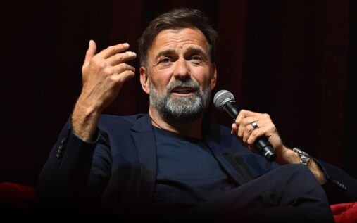 Jurgen Klopp looking thoughtful on the touchline during a football match